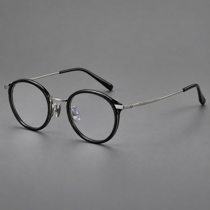Retro panto eyeglasses in acetate and titanium with an arched bridge and engraved metal temples in Glossy Black / Matte Gunmetal, three quarter view additional product view