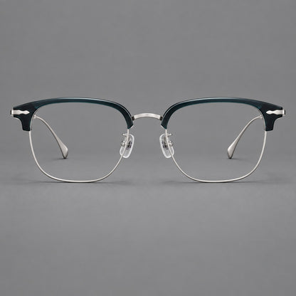 Browline eyeglasses in acetate and titanium with slim metal lower rims and decorative corners in Peacock Blue / Silver, front view frame detail