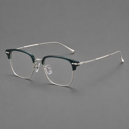 Browline eyeglasses in acetate and titanium with slim metal lower rims and decorative corners in Peacock Blue / Silver, three quarter view front view