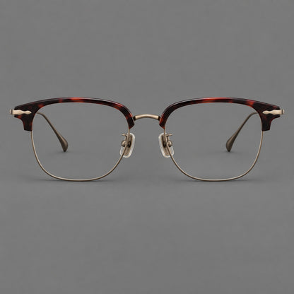 Browline eyeglasses in acetate and titanium with slim metal lower rims and decorative corners in Red Tortoiseshell / Antique Bronze, front view temple detail