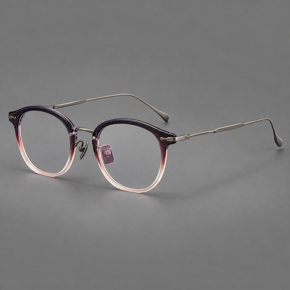 Panto eyeglasses in acetate and titanium with curved brows and decorative metal corner accents in Purple Pink Gradient / Gunmetal, three quarter view