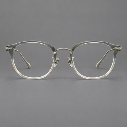Panto eyeglasses in acetate and titanium with curved brows and decorative metal corner accents in Ice Blue Tea / Silver, front view additional product view