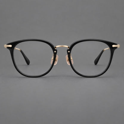 Classic soft square eyeglasses in acetate and titanium with engraved temples and corner accents in Glossy Black / Gold, front view additional product view
