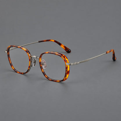 Rounded square eyeglasses in acetate and titanium with an arched bridge and engraved temples in Amber Tortoiseshell / Gunmetal, three quarter view