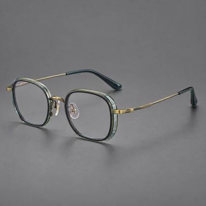 Rounded square eyeglasses in acetate and titanium with an arched bridge and engraved temples in Misted Clear Green / Antique Gold, three quarter view front view