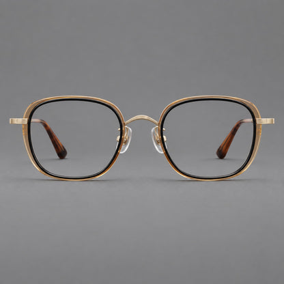 Rounded square eyeglasses in acetate and titanium with an arched bridge and engraved temples in Black and Clear Tea / Light Gold, front view temple detail