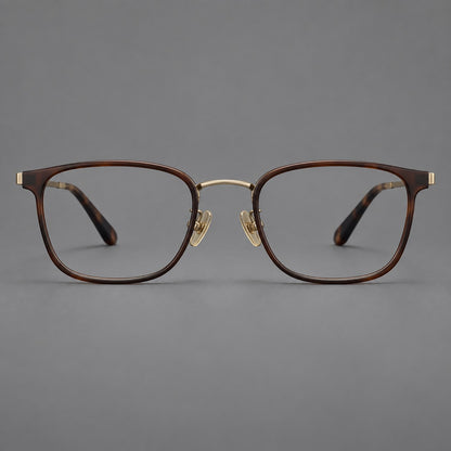 Rounded rectangular eyeglasses in acetate and titanium with bold corners and engraved metal temples in Coffee Brown / Antique Bronze, front view additional product view