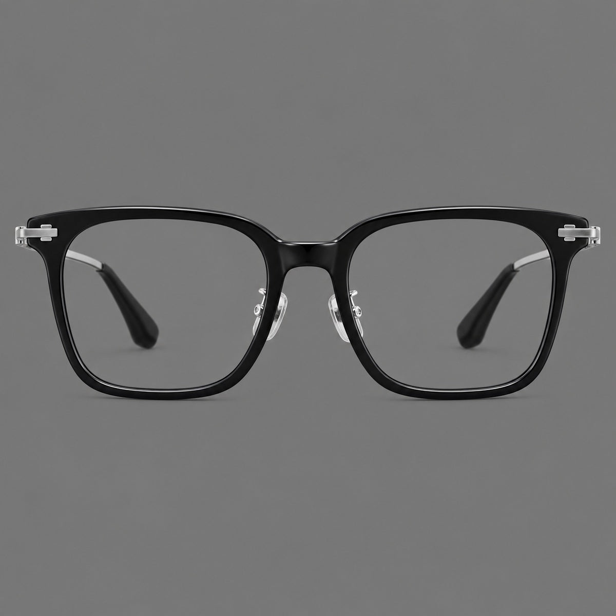 Classic acetate and titanium eyeglasses with broad square rims and textured metal temples in Black / Silver, front view