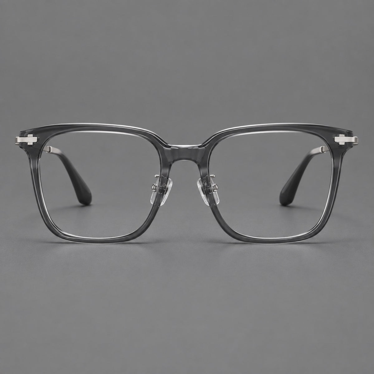 Classic acetate and titanium eyeglasses with broad square rims and textured metal temples in Clear Grey / Silver, front view