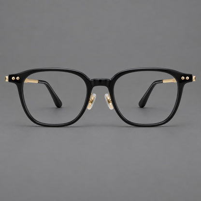 Vintage acetate and titanium eyeglasses with rounded square rims and slotted metal temples in Black / Gold, front view side view