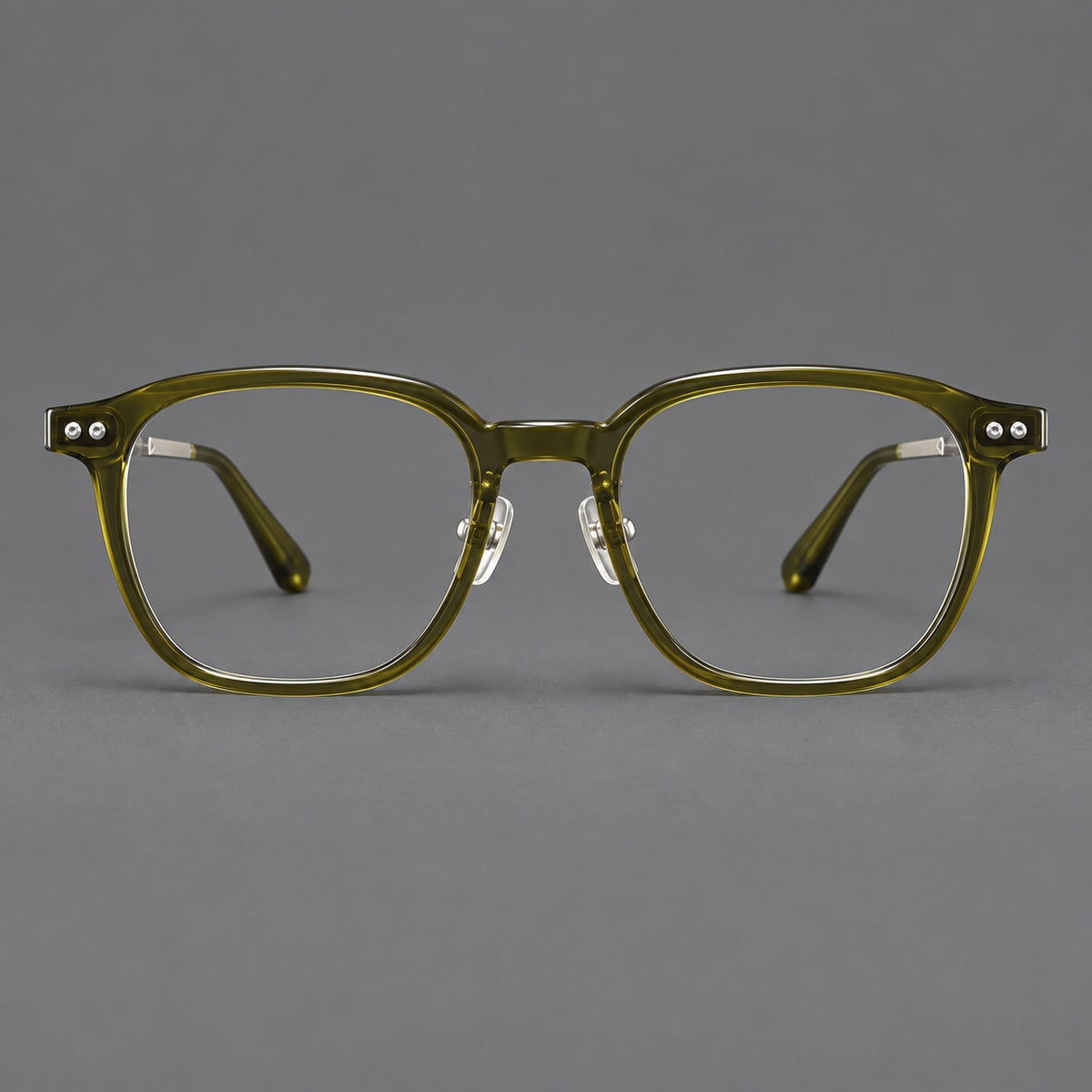 Vintage acetate and titanium eyeglasses with rounded square rims and slotted metal temples in Clear Olive Green / Silver, front view