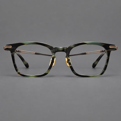 Acetate and titanium eyeglasses with rounded rectangular rims and sculpted open loop joints in Green Tortoiseshell / Antique Bronze, front view side view