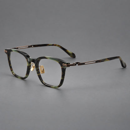 Acetate and titanium eyeglasses with rounded rectangular rims and sculpted open loop joints in Green Tortoiseshell / Antique Bronze, three quarter view