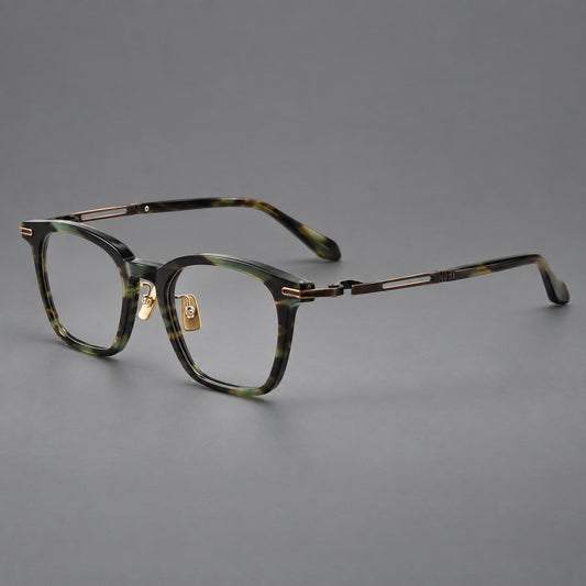 Acetate and titanium eyeglasses with rounded rectangular rims and sculpted open loop joints in Green Tortoiseshell / Antique Bronze, three quarter view