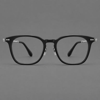 Retro acetate and titanium eyeglasses with gently squared rims and circular metal hinges in Black / Silver, front view frame detail