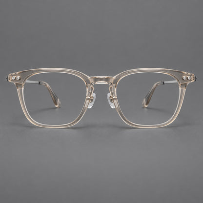 Retro acetate and titanium eyeglasses with gently squared rims and circular metal hinges in Clear Cool Tea / Silver, front view additional product view