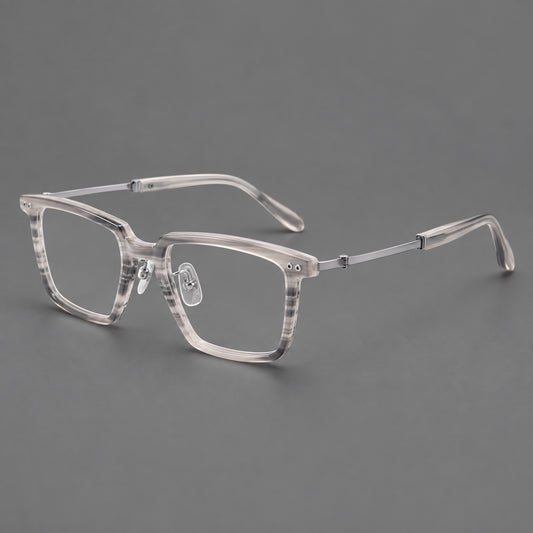 Classic acetate and titanium eyeglasses with a straight brow and rounded rectangular rims in Striped Grey / Silver, three quarter view