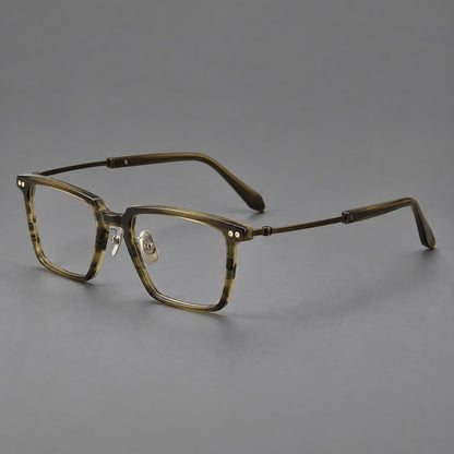Classic acetate and titanium eyeglasses with a straight brow and rounded rectangular rims in Striped Olive Green / Bronze, three quarter view front view