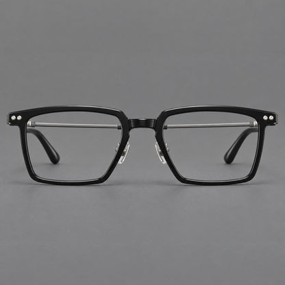 Classic acetate and titanium eyeglasses with a straight brow and rounded rectangular rims in Black / Brushed Grey, front view temple detail