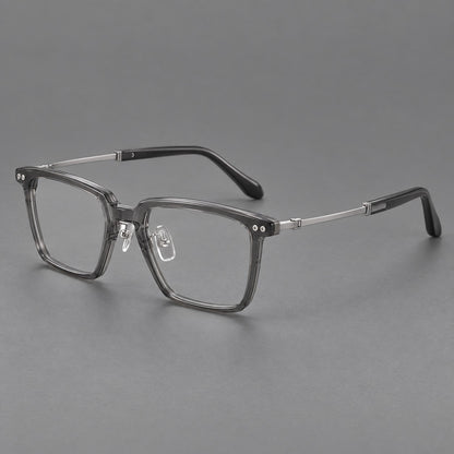 Classic acetate and titanium eyeglasses with a straight brow and rounded rectangular rims in Clear Grey / Silver, three quarter view additional product view