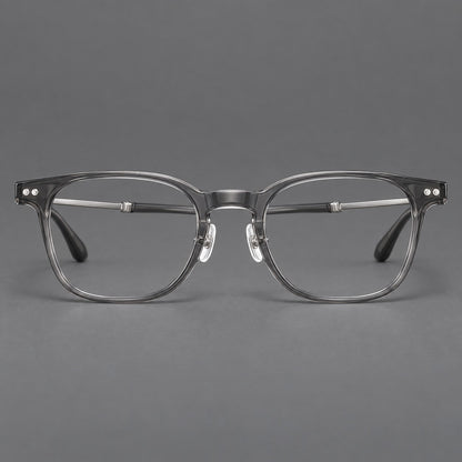 Vintage acetate and titanium eyeglasses with soft square rims and paired metal rivets in Clear Grey / Brushed Grey, front view temple detail