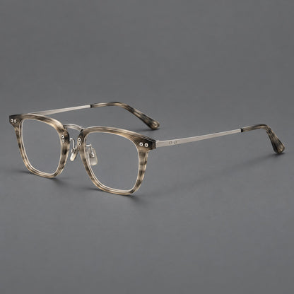 Acetate and titanium eyeglasses with soft square rims and an arched metal bridge in Grey Woodgrain / Silver, three quarter view front view