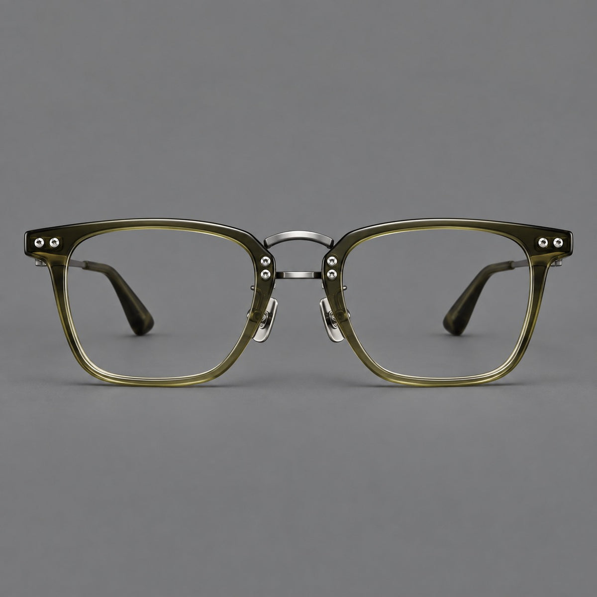 Acetate and titanium eyeglasses with soft square rims and an arched metal bridge in Army Green / Gunmetal, front view