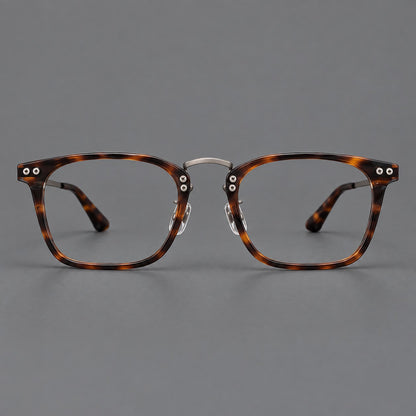 Acetate and titanium eyeglasses with angular rectangular rims and a curved metal bridge in Tortoiseshell / Gunmetal, front view side view