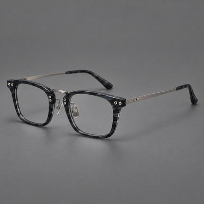 Acetate and titanium eyeglasses with angular rectangular rims and a curved metal bridge in Grey Blue Woodgrain / Gunmetal, three quarter view front view
