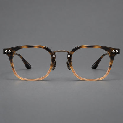 Retro acetate and titanium eyeglasses with softly rounded rims and a metal bridge in Tortoiseshell / Gunmetal, front view side view