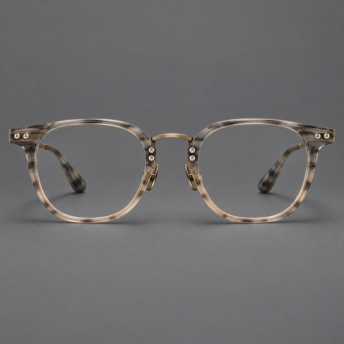 Retro acetate and titanium eyeglasses with softly rounded rims and a metal bridge in Light Grey Woodgrain, front view