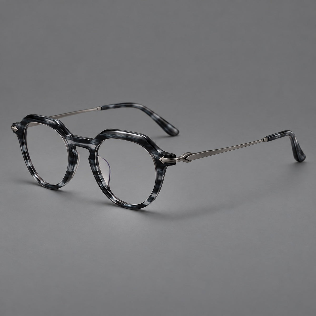 Retro acetate and titanium eyeglasses with panto rims and decorative arrow corner accents in Grey Blue Woodgrain / Gunmetal, three quarter view