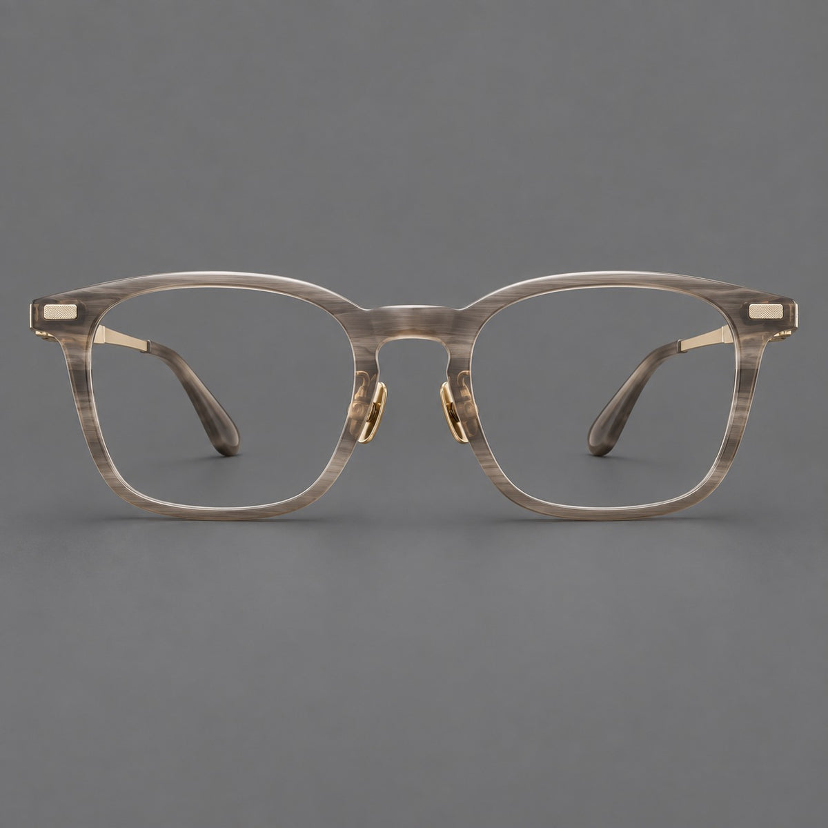 Classic acetate and titanium eyeglasses with rounded square rims and textured corner accents in Grey Woodgrain / Light Gold, front view