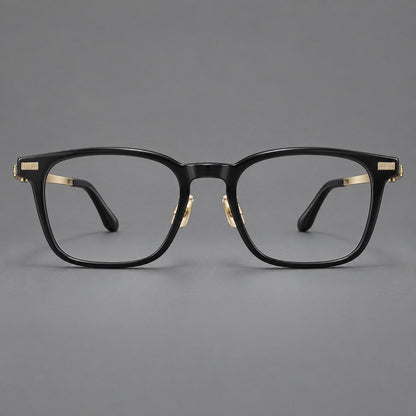 Classic acetate and titanium eyeglasses with rounded square rims and textured corner accents in Black / Gold, front view temple detail