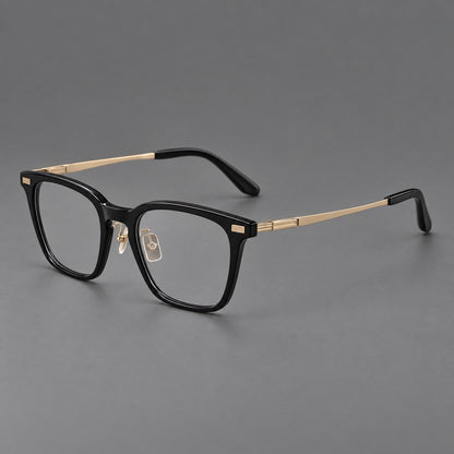 Classic acetate and titanium eyeglasses with rounded square rims and textured corner accents in Black / Gold, three quarter view lens detail