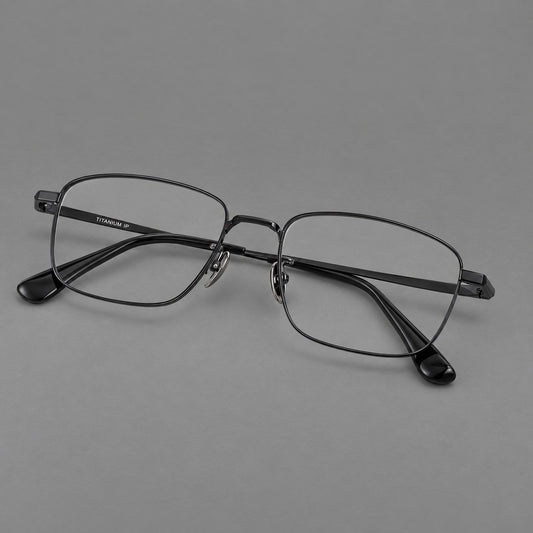 Modern square titanium glasses with an angular bridge and broad straight temples in Black, three quarter view