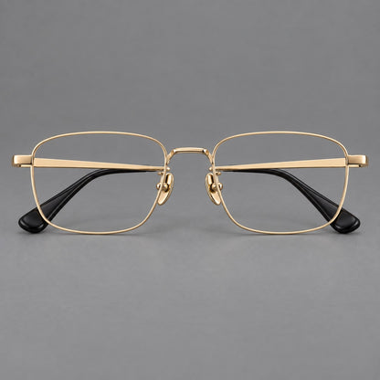 Modern square titanium glasses with an angular bridge and broad straight temples in Gold, front view temple detail