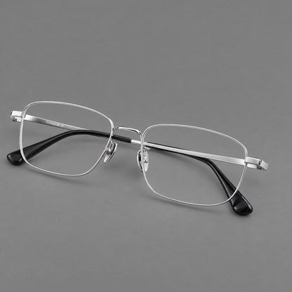 Modern square titanium glasses with an angular bridge and broad straight temples in Silver, three quarter view additional product view