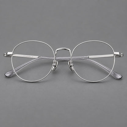 Retro round titanium glasses with a raised bridge and smooth corner shoulders in Silver, front view additional product view