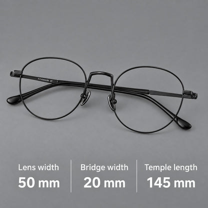 Retro round titanium glasses with a raised bridge and smooth corner shoulders, size guide in millimetres additional product view