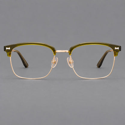 Classic browline titanium glasses with fine lower rims and subtle corner accents in Green and Gold, front view temple detail