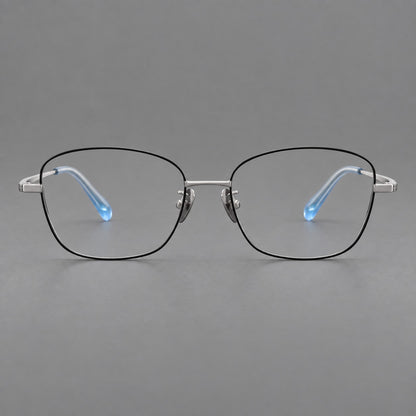 Soft square titanium glasses with angled upper corners and decorated hinges in Black and Silver, front view frame detail