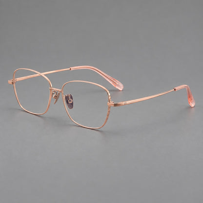 Soft square titanium glasses with angled upper corners and decorated hinges in Rose Gold, three quarter view additional product view