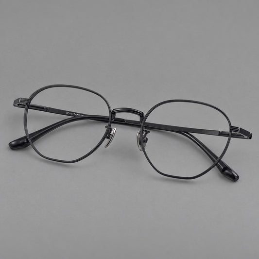 Retro panto titanium glasses with a curved bridge and fine parallel rim grooves in Black, three quarter view