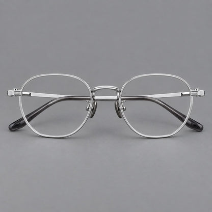 Retro panto titanium glasses with a curved bridge and fine parallel rim grooves in Silver, front view temple detail