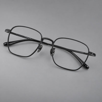 Deep square titanium glasses with a flatter brow and grooved outer shoulders in Black, three quarter view