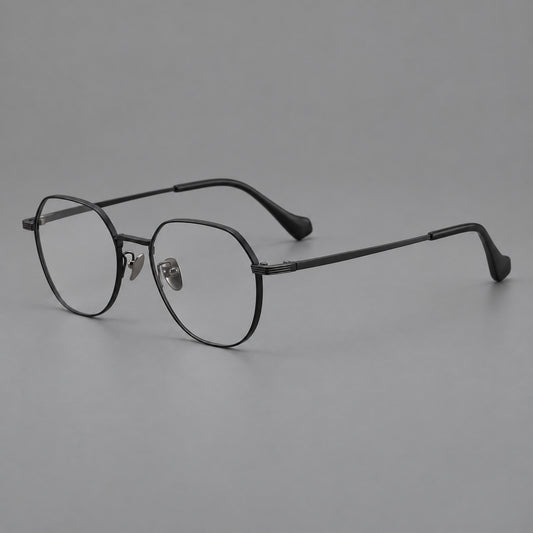 Geometric titanium glasses with soft polygonal rims and fine shoulder detailing in Black, three quarter view