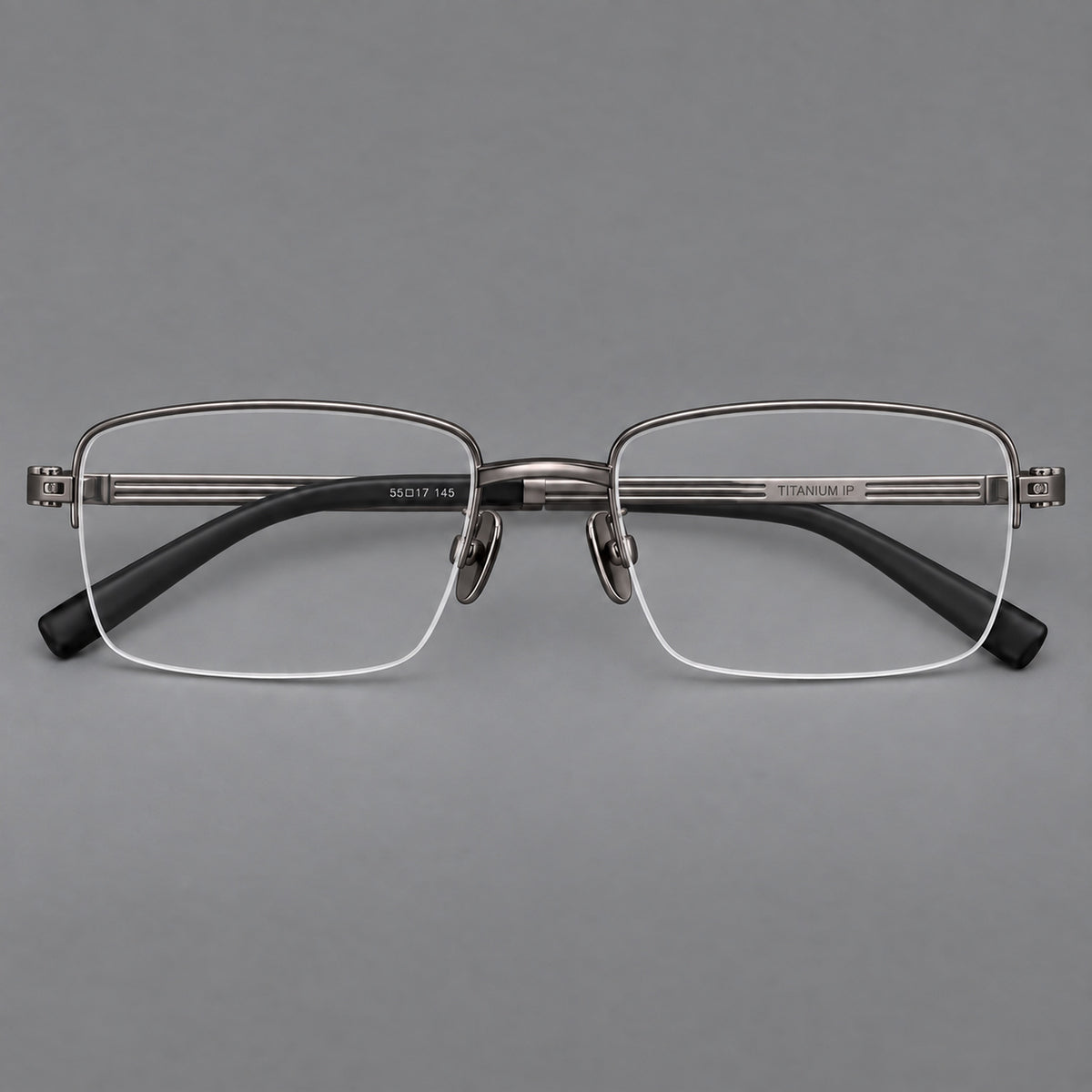 Classic half frame titanium glasses with rectangular lenses and lined temples in Gunmetal, front view