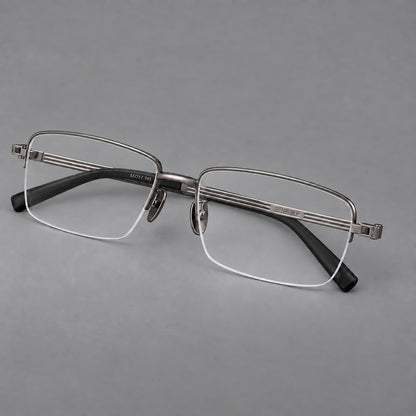 Classic half frame titanium glasses with rectangular lenses and lined temples in Gunmetal, three quarter view front view