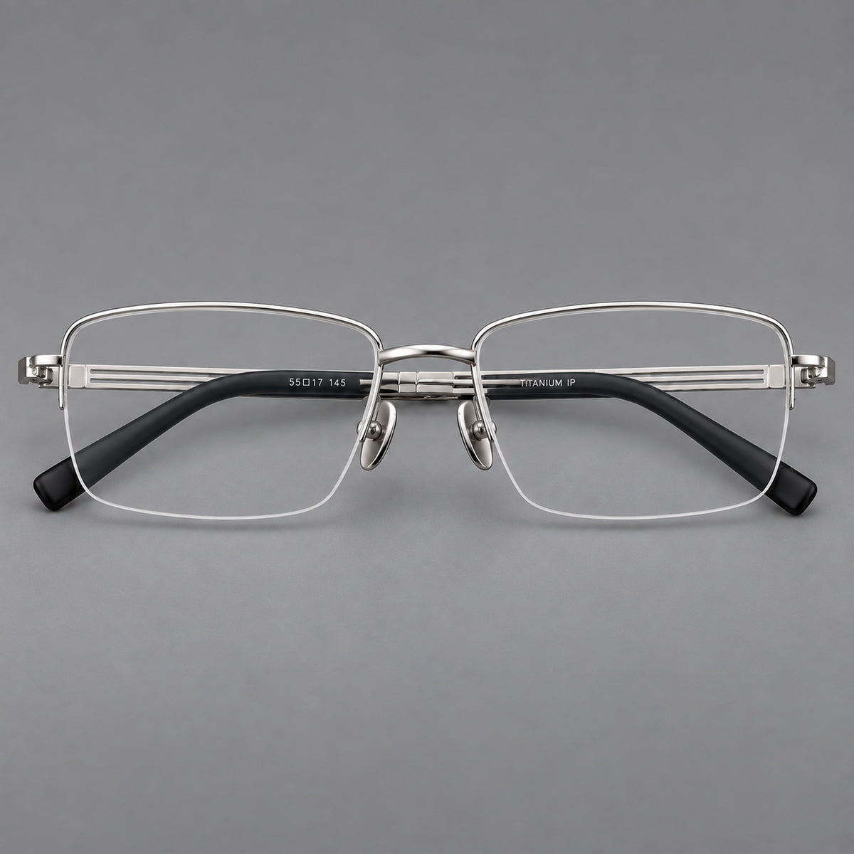Classic half frame titanium glasses with rectangular lenses and lined temples in Silver, front view
